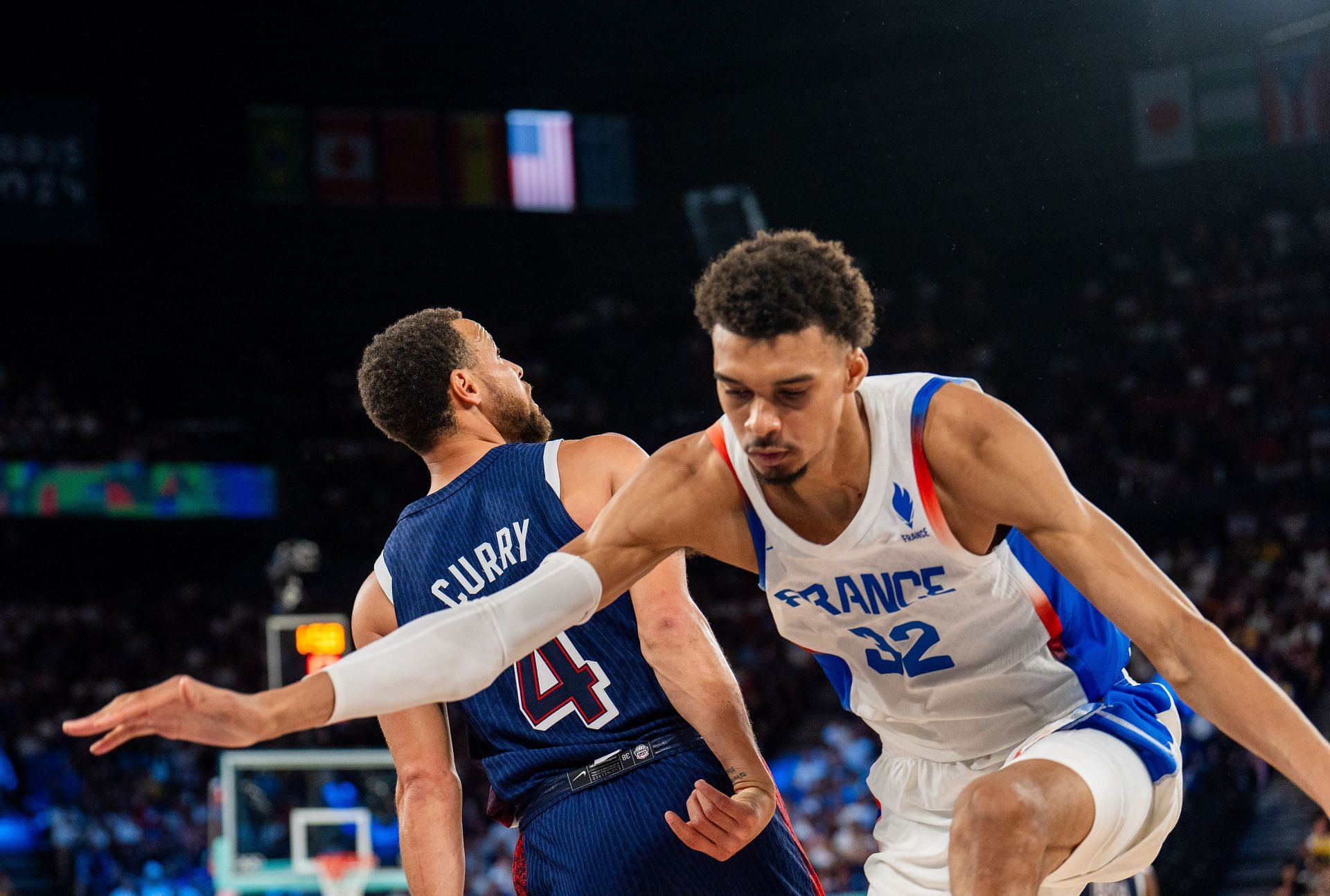 Stephen Curry (4) of Team USA in action against Victor Wembanyama of France during Men's Gold Medal game - Source: Getty